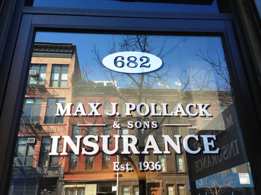 Window sign for Max J. Pollack & Sons Insurance at 682 Union Street, established 1936.